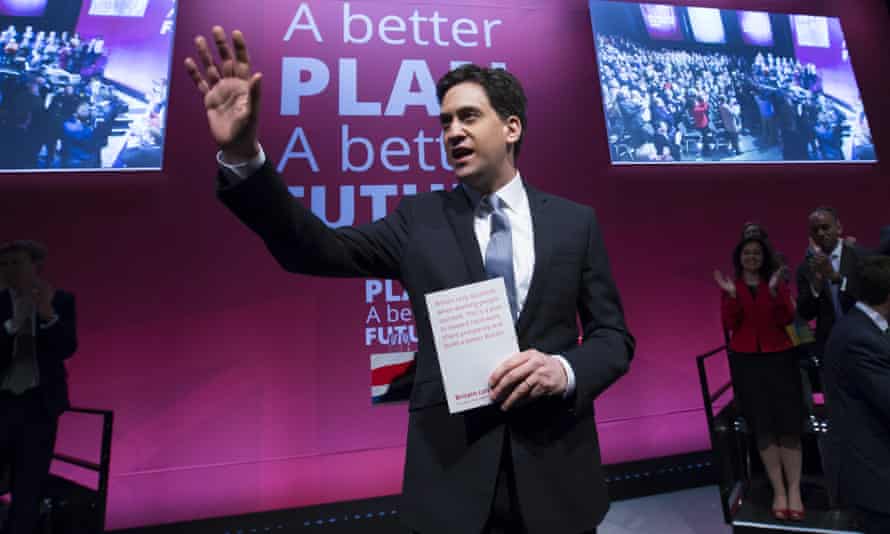 Ed Miliband waves as he arrives to speak at the launch of the party’s election manifesto in Manchester, England.