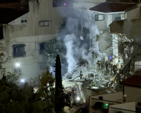 Search and rescue teams are working to find missing people after an Iranian strike hit an apartment building in Haifa, Israel.