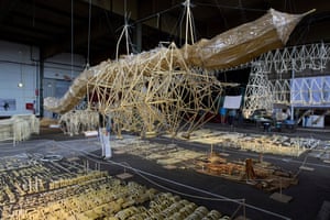 A large sculpture by the Dutch artist Theo Jansen in a warehouse space