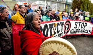 Indigenous leaders and supporters block the entrance to the Kinder Morgan pipeline project terminal work-site in Burnaby, British Columbia, Canada on April 7, 2018.