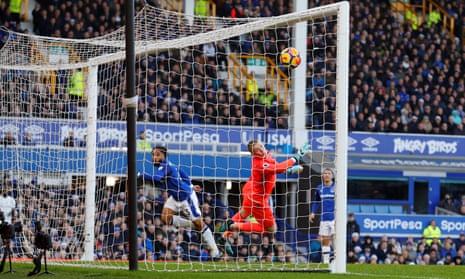 Everton’s Ashley Williams sees his header strike his own crossbar, with Jordan Pickford helpless, during the goalless draw with Chelsea