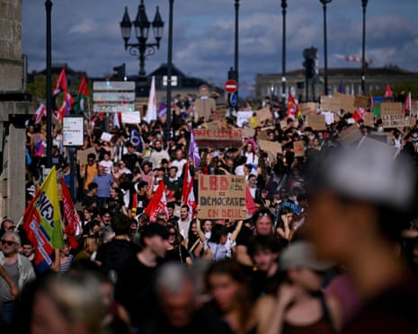 Protesters hold placards during a demonstration of high-school students in Bordeaux, southwestern France.