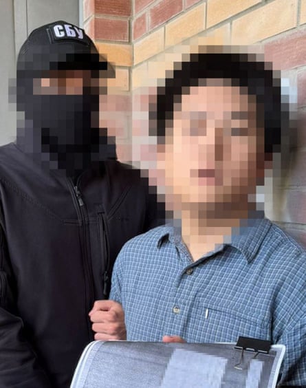 A pixillated image of the younger Chinese national detained by the SBU in Kyiv.