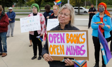 Demonstrators gather to protest against banning books in Dearborn, Michigan.