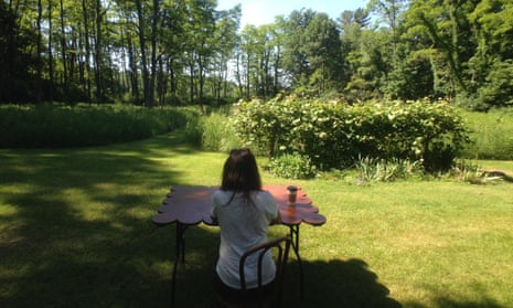Single Woman Outdoors, Sitting At A Table
