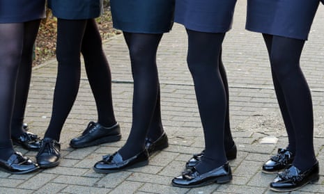 A group of girls in school uniform.