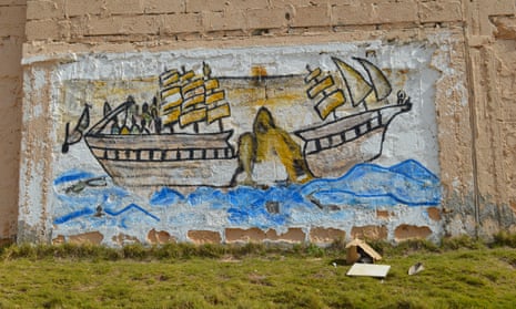 A mural at the government-run Bou Slim detention centre in Tripoli evokes the broken dreams of many migrants.