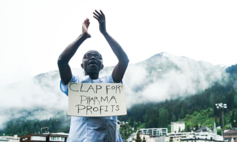 In Davos, George Poe Williams, a nurse from Liberia, stages a protest against the profits made by drugmakers.
