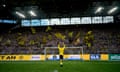 Marco Reus takes in the applause from the Yellow Wall after scoring in Dortmund’s 5-1 victory against Augsburg.
