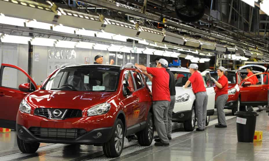 workers complete final checks on the production line at Nissan’s car plant in Sunderland.