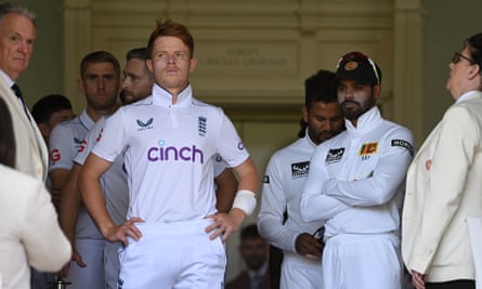 Ollie Pope and Dhananjaya de Silva lead out their teams