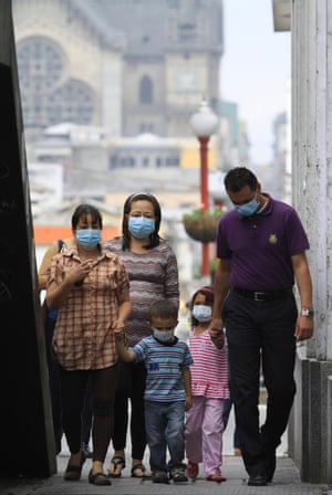 Residents of Manizales wear masks following a small eruption of the Ruiz Volcano in 2012.