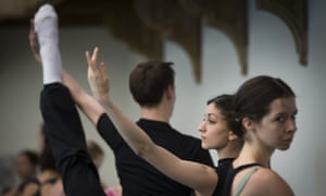 Ballet dancers warm up during a rehearsal in the Bolshoi Theatre