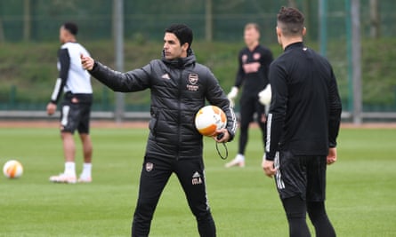 Arsenal manager Mikel Arteta gives instructions to Granit Xhaka at a training session on Wednesday.