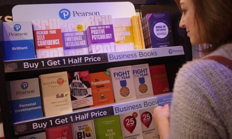 woman browsing rack of Pearson book titles in bookshop