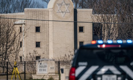 A law enforcement vehicle sits in front of the Congregation Beth Israel synagogue in Colleyville, Texas. 