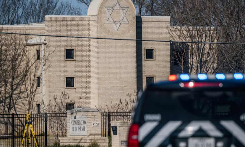 A police car in front of the Congregation Beth Israel synagogue on Sunday in Colleyville, Texas.