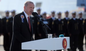 President Recep Tayyip ErdoÄan makes a speech on the deck of the TCG Burgazada, a new warship.