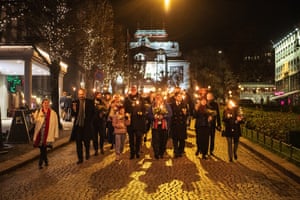 Members of the Human Rights Data Analysis Group (HRDAG) at a torchlight procession after receiving the Rafto prize.