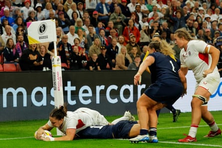 Amy Cokayne of England scores her team’s seventh try