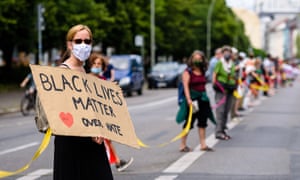 Several thousand people take part in a demonstration titled ‘Unteilbar’ (indivisible), forming a human chain to protest for against racism and social injustice.