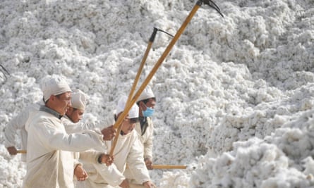 Workers at a cotton factory in Awat county, in China’s Xinjiang region.