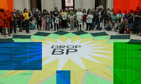 Protesters stand around a ‘Drop BP’ banner at the British Museum in April 2022