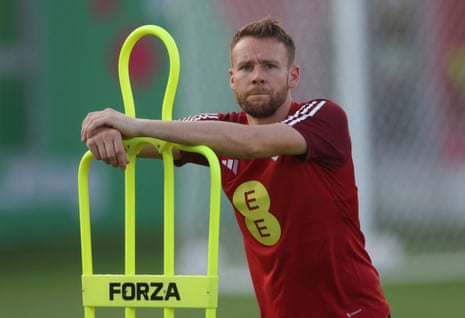 Chris Gunter rests on a mannequin’s shoulder during Wales training.