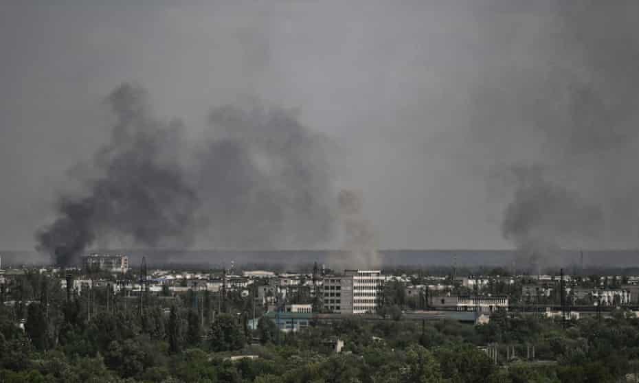 Smoke and dirt rise from the city of Severodonetsk, during shelling in the eastern Ukrainian region of Donbas, on May 26, 2022