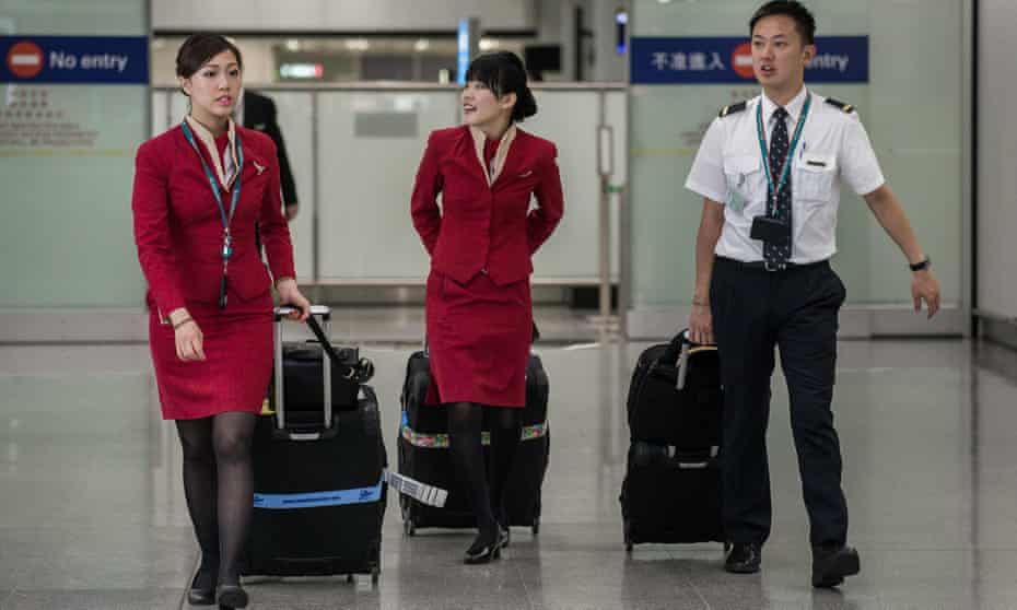 Cathay Pacific staff at Hong Kong international airport.