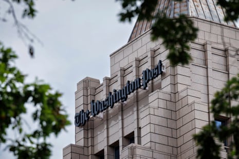 a sign on a building reads 'the washington post'