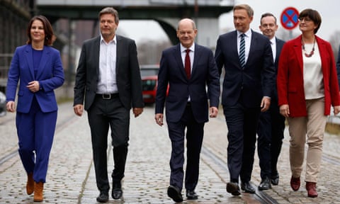Germany’s new traffic light coalition, with the chancellor, Olaf Scholz (centre), the Greens’ Annalena Baerbock and Robert Habeck (left of Scholz), the Liberal Democrats Christian Lindner and Volker Wissing, and the SPD’s Saskia Esken to the right.