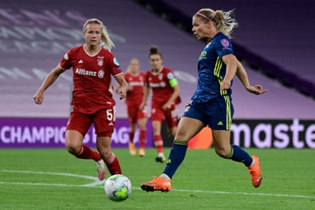 Eugenie Le Sommer takes on Bayern Munich’s Hanna Glas during the quarter-final in Bilbao.