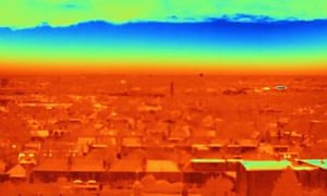 A thermal image of London rooftops indicates heat loss through roofs.