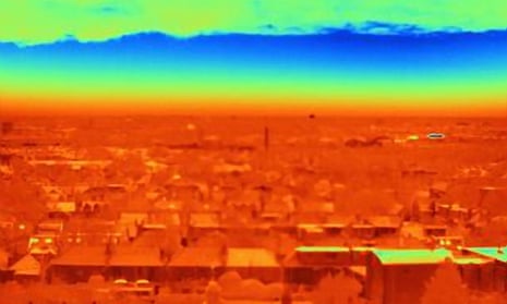 A thermal image of London rooftops indicates heat loss through roofs.