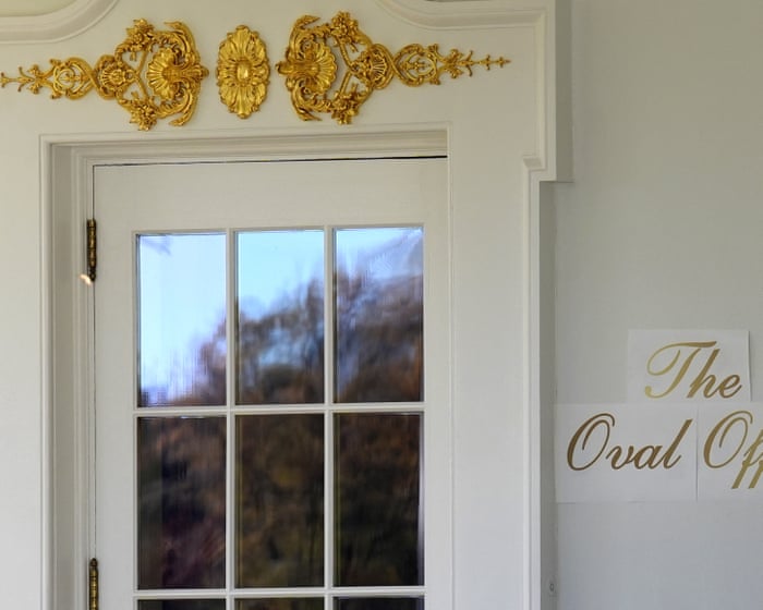 Trump’s gold sign outside Oval Office prompts backlash