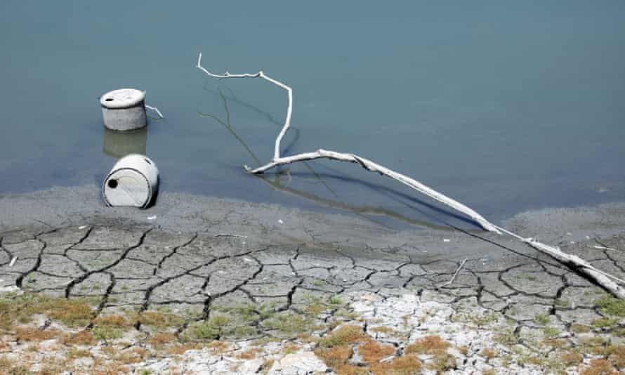 Containers are exposed as the waters of Sun Moon lake in Nantou, Taiwan, recede during a nationwide drought