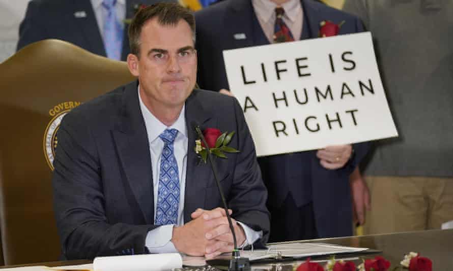 Oklahoma Gov. Kevin Stitt speaks after signing into law a bill making it a felony to perform an abortion, punishable by up to 10 years in prison on April 12, 2022/