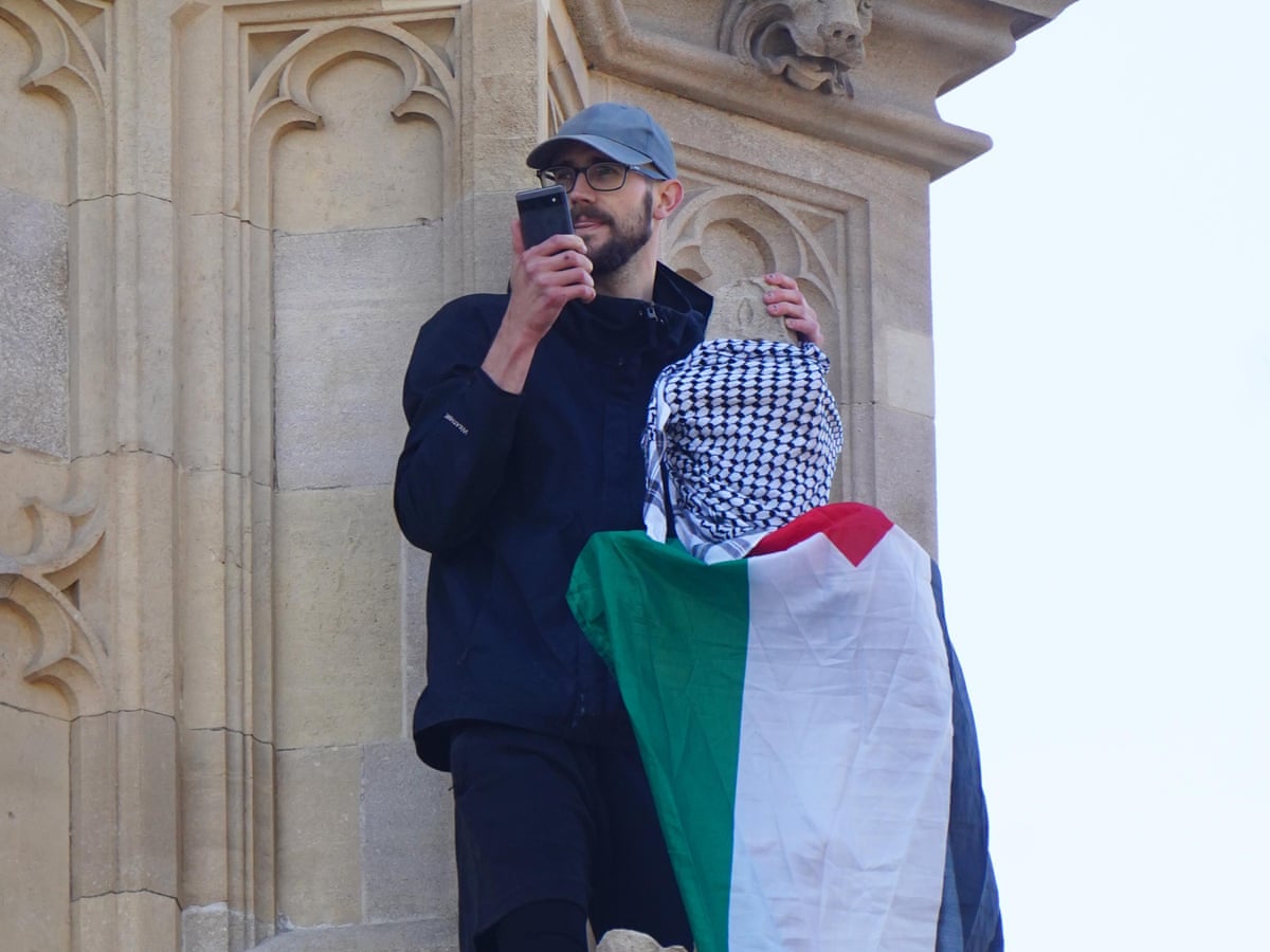 Palestine protester safely brought down from Big Ben clock tower after 16 hours | Protest | The Guardian