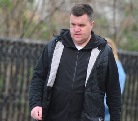 Gangster Steven “Bonzo” Daniel, walking in a black coat
