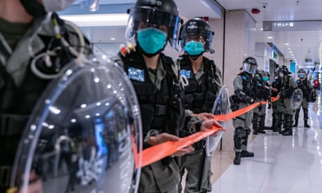 Riot police at a Hong Kong shopping centre during a ‘Sing With You’ rally on Tuesday.