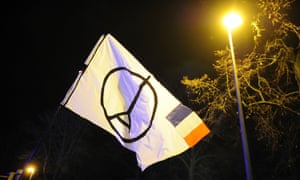 A flag is waved in tribute for the victims of Paris.