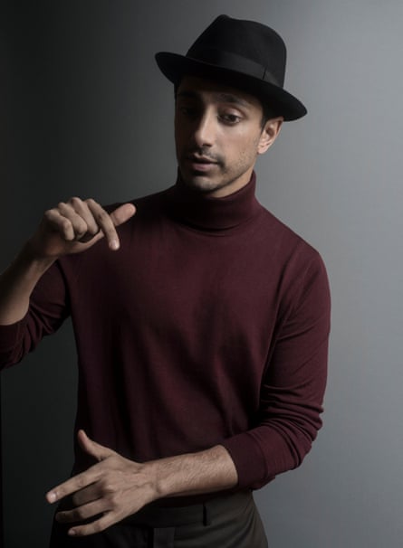 Rocket man: Riz Ahmed wears roll neck by Pringle of Scotland; trousers by Dior Homme; and fedora by Lock &amp; Co Hatters (Mr Porter).