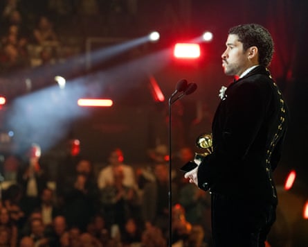 Bad Bunny wears a Schiaparelli suit at the Grammy awards.