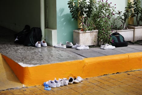 A view of students' shoes and bags left at the scene following the deadly shooting at Debsirin Nonthaburi School.