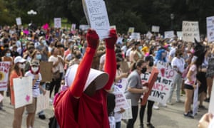 Cindy Gomez, of Austin, attends the Women’s March ATX rally, at the Texas State Capitol in Austin, Texas, last fall.