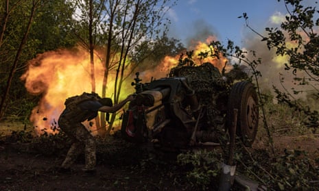 A Ukrainian soldier firing artillery at Russian positions near Klishchiivka last month