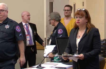 Michael David McKee walking into the courtroom on Monday, 12 January 2026, in Rockford, Illinois.