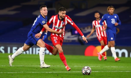 César Azpilicueta puts his arm across Yannick Carrasco after playing a short back-pass, but no penalty was awarded