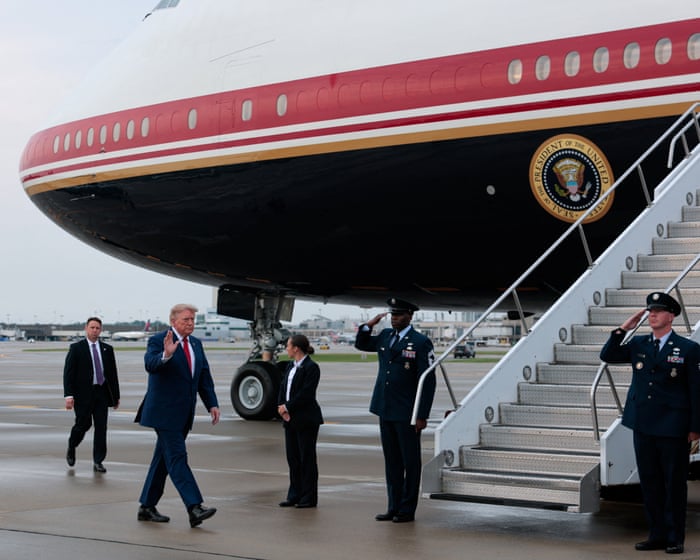 Trump plays down Air Force One plane switch as criticism grows over ‘decoy’ passengers – US politics live